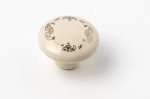 81035 - knopka 38mm porc.slon. kost/zlatý ornament