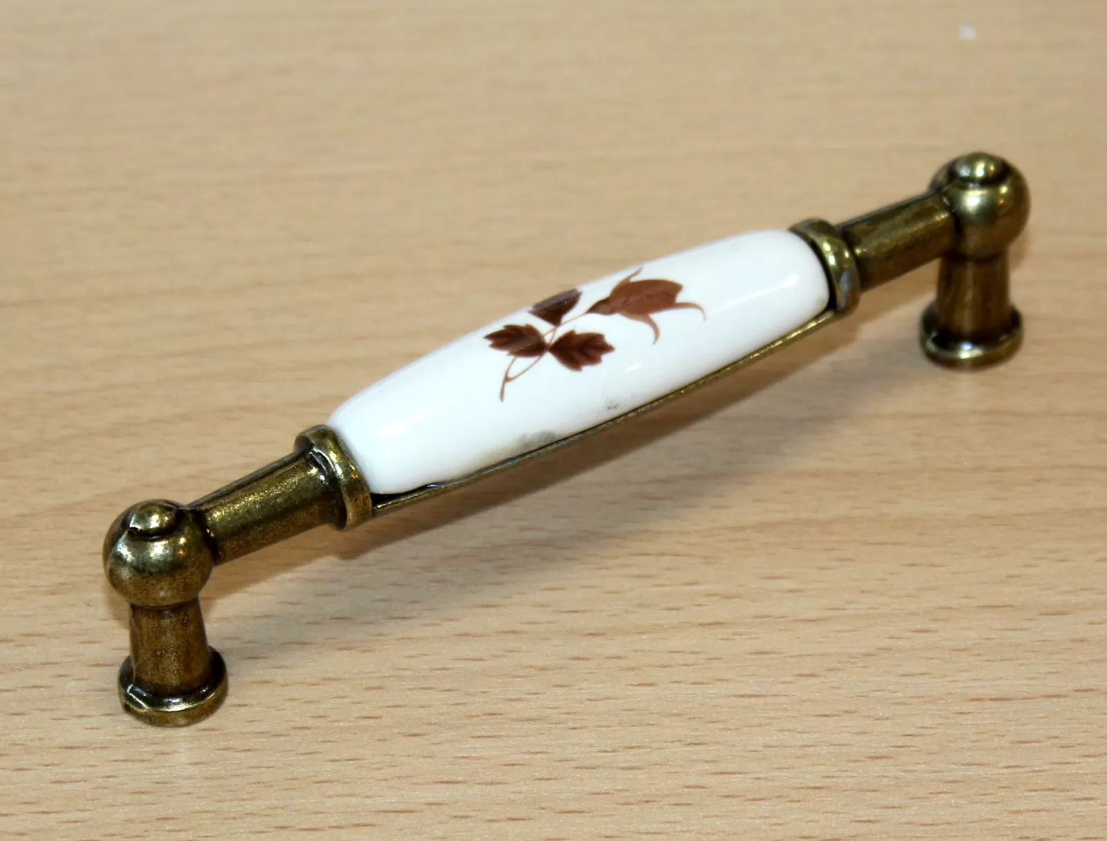 11008 úchyt 96mm staromosaz-porcelán/podzim
